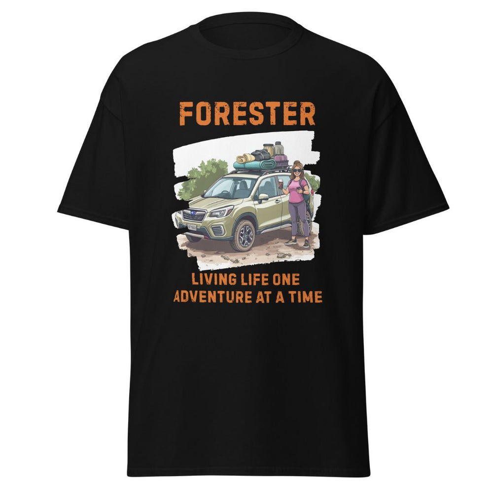Black t-shirt with a graphic of a car and person, text 'Forester' and 'Living Life One Adventure at a Time', on a white background.